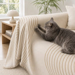 Cat resting on the arch lines couch cover