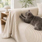 Cat resting on the arch lines couch cover