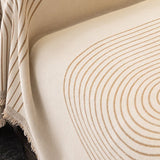 Close-up of the woven tan arch lines on the cream chenille jacquard