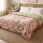 Reversible boho floral blanket spread on a queen bed