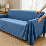Pet-Friendly Herringbone Couch Cover · Ocean Indigo - hands install