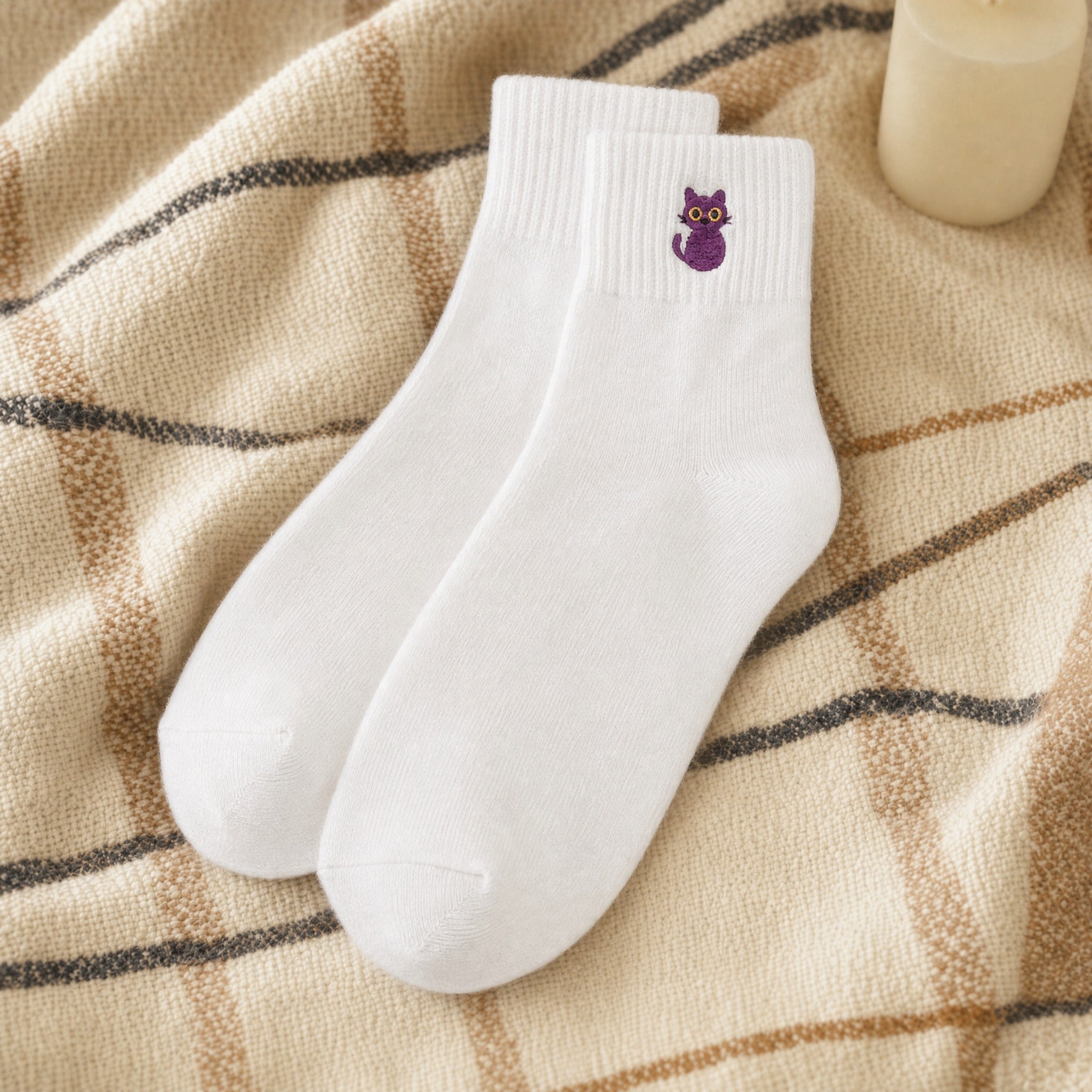 Black cat sock styled, white