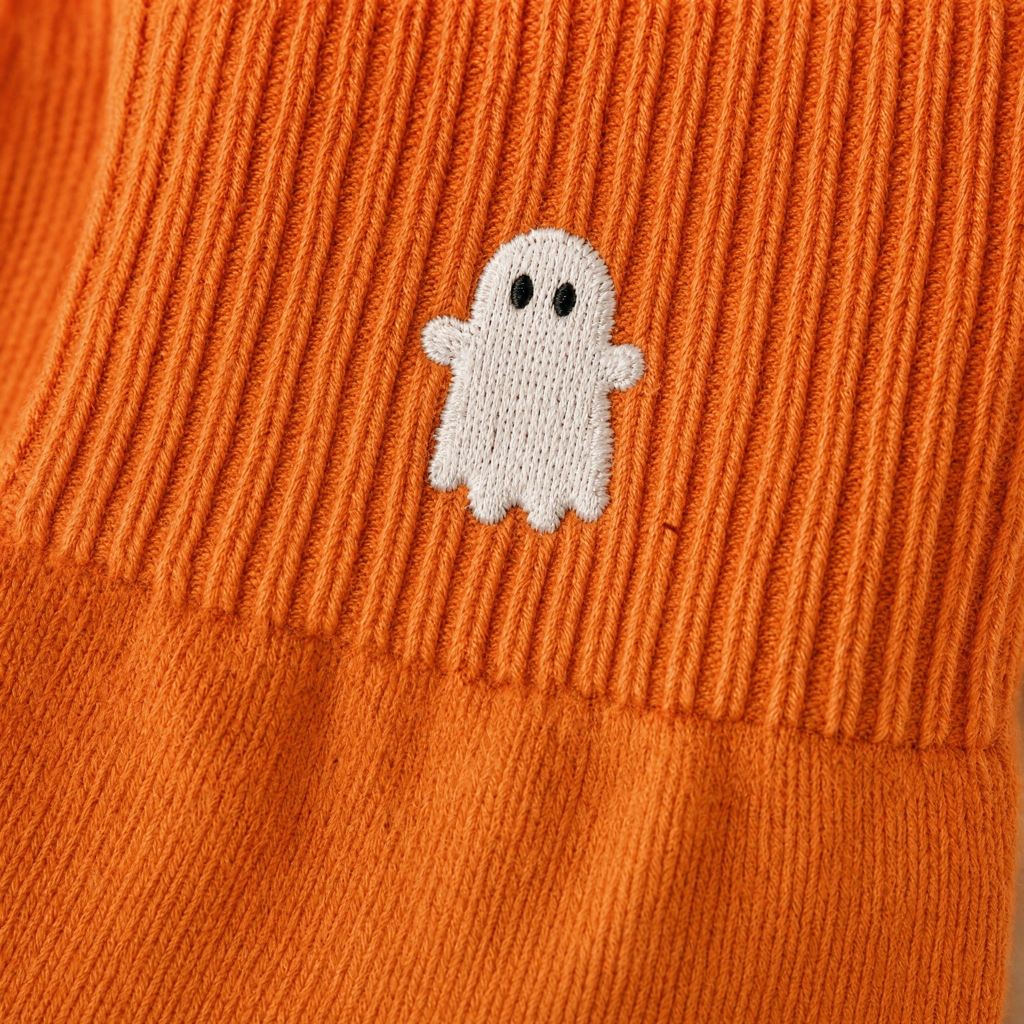 Ribbed knit macro, ghost embroidery