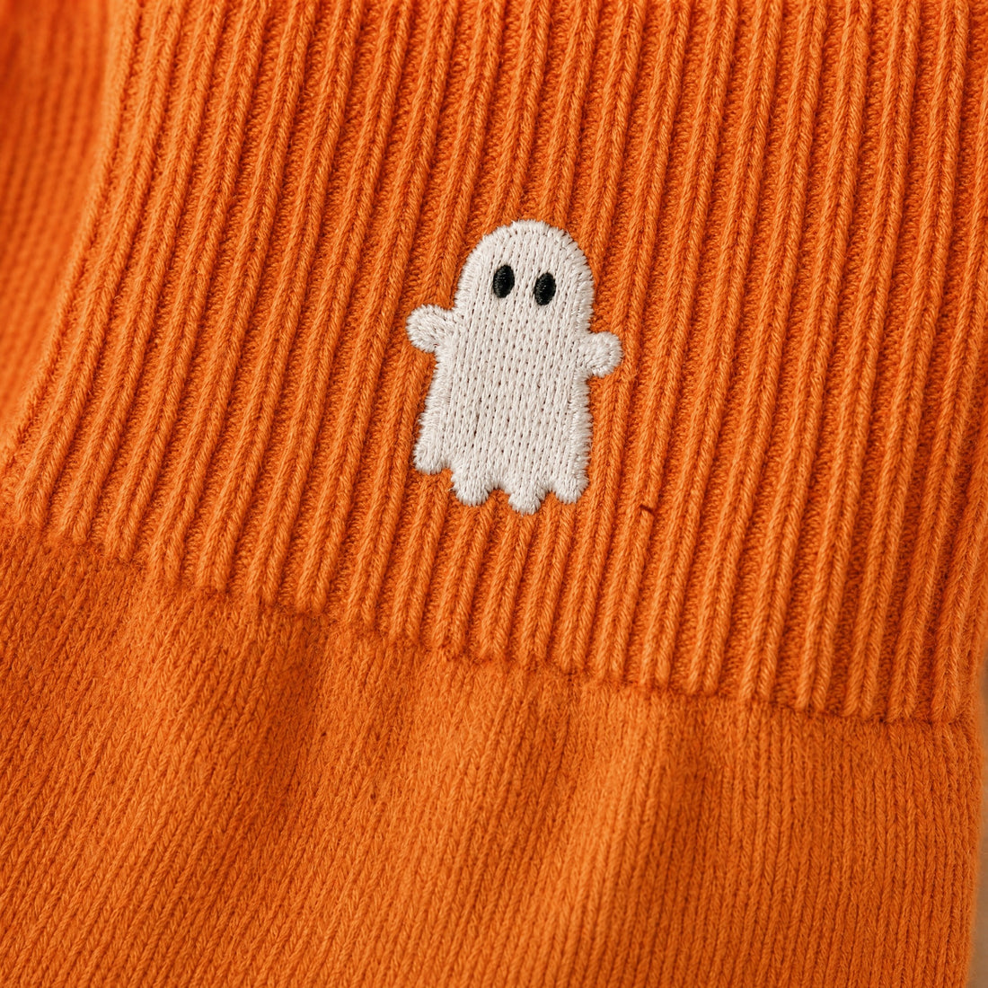 Ribbed knit macro, ghost embroidery