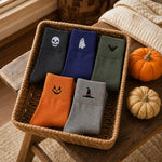 Five pair Halloween sock set in a woven basket
