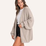 Grey beige oversized open-front knit cardigan, side view on model :: The model is 5'6" and wears a size M