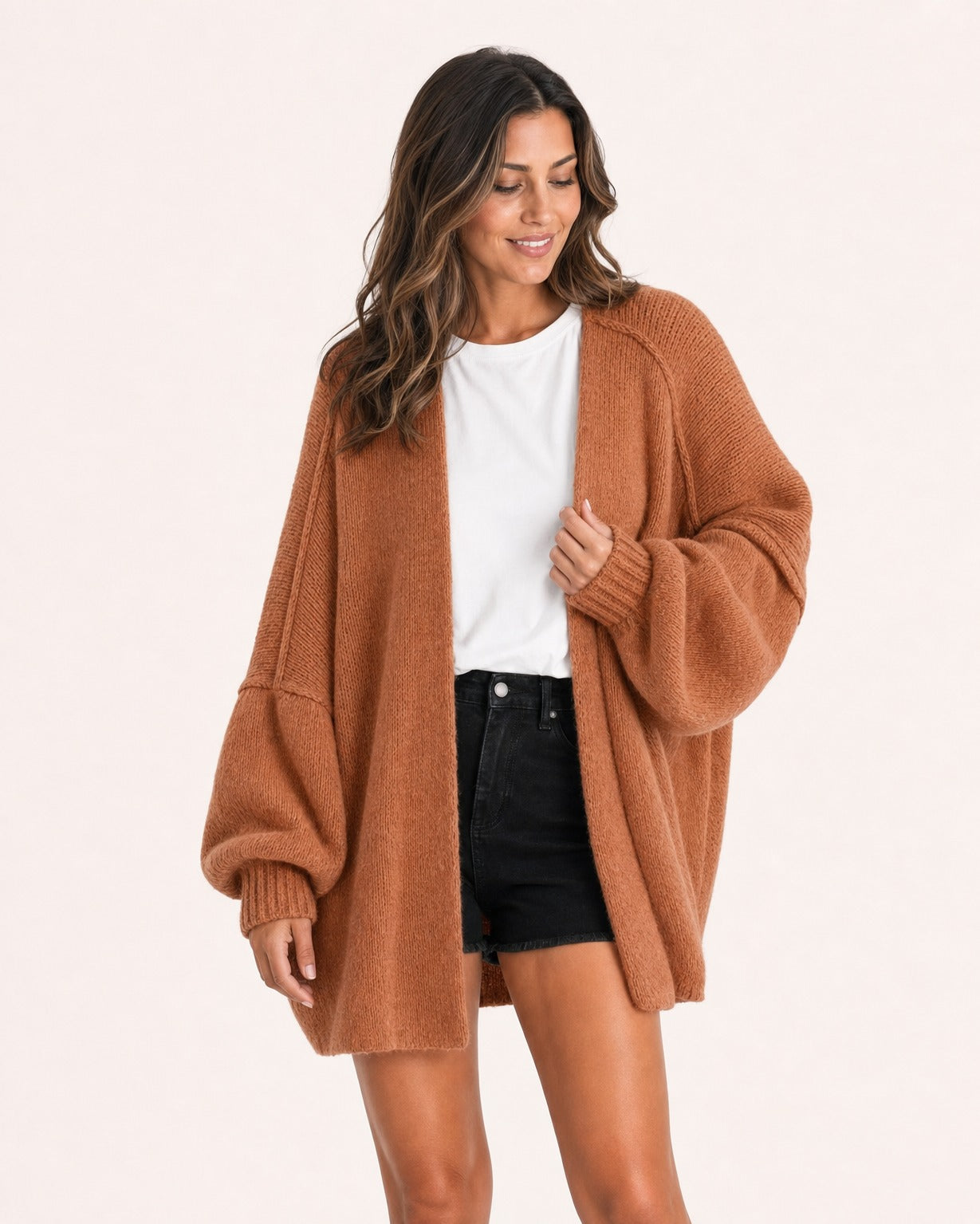 Rust oversized open-front knit cardigan, front view on model :: The model is 5'6" and wears a size M